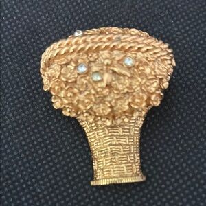 This is an Avon vintage solid perfume fragrance brooch. Could find the year.